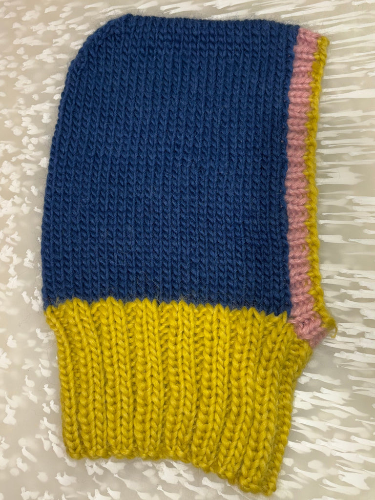 Knitted Balaclava with blue, pink, and yellow sections